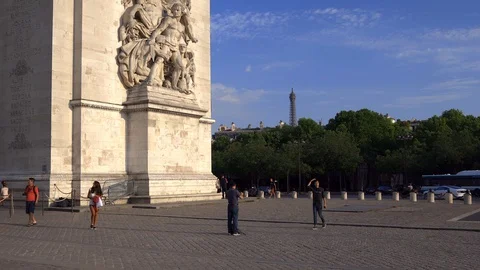 Tourists visiting the Arc de Triomphe on the Place de l'Etoile square in Paris Stock Footage 127632876