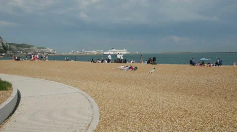 Tourists visiting Dover Harbour Beach Stock Footage 64104342