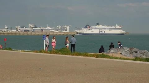 Tourists visiting Dover Seafront Promenade and Harbour Beach Stock Footage 64104036