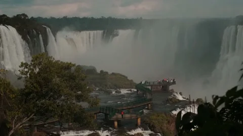 Tourists visiting the falls Stock Footage 138070677