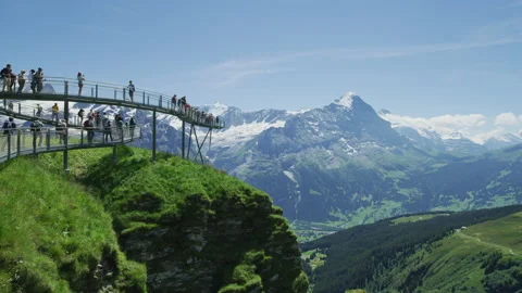 Tourists visiting the First Cliff Walk, Grindelwald Stock Footage 219706866
