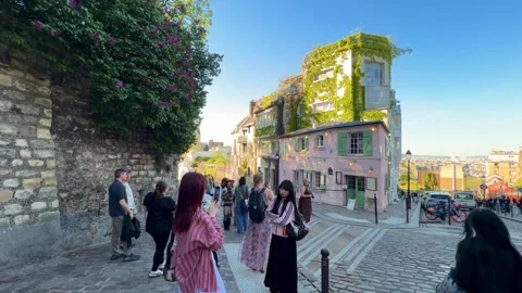 Tourists visiting La Maison Rose in Montmartre, Paris, France Stock Footage 337783811