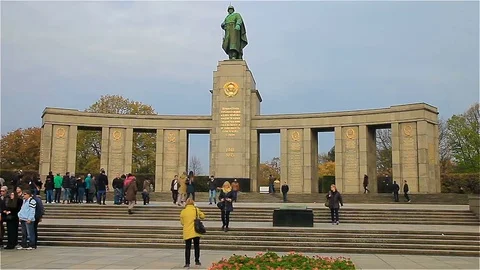 Tourists visiting the memorial to the fallen Soviet soldiers Stock Footage 82649566