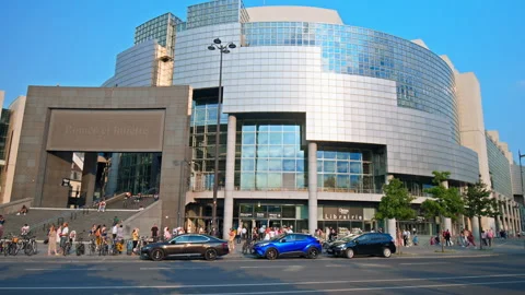 Tourists visiting modern opera house in the 12th arrondissement of Paris. Stock Footage 245457766