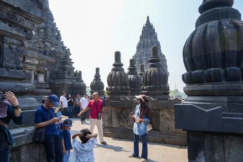 Tourists visiting Prambanan Temple complex. Stock Photos