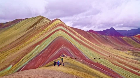 Tourists visiting the Rainbow Mountains Stock Footage 85393160