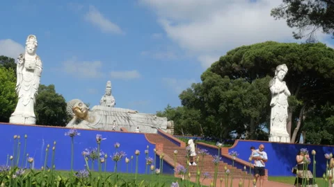Tourists Visiting Reclining Buddha Statue at Eden Garden Portugal 動画素材 337110604