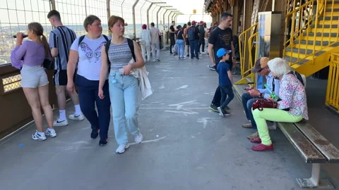 Tourists visiting the second floor of the Eiffel Tower in Paris, France Stock Footage 196151268