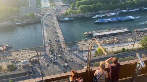 Tourists visiting the second floor of the Eiffel Tower in Paris, France Stock Footage 197111503