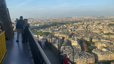 Tourists visiting the second floor of the Eiffel Tower in Paris, France Stock Footage 197259067
