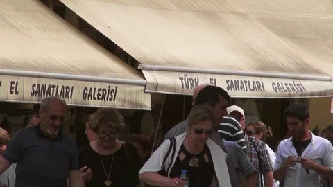 Tourists visiting the shops Stock Footage 69899179