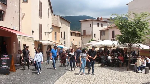 Tourists visiting small ancient town Sermoneta. Stock Footage 124666876