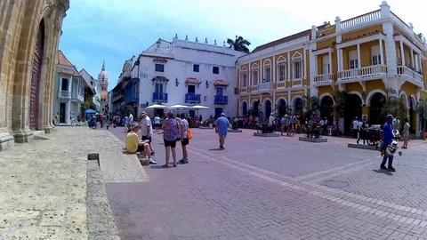 Tourists visiting St. Peter Claver's Square in Cartagena de Indias, Colombia Stockbeeldmateriaal 89014760