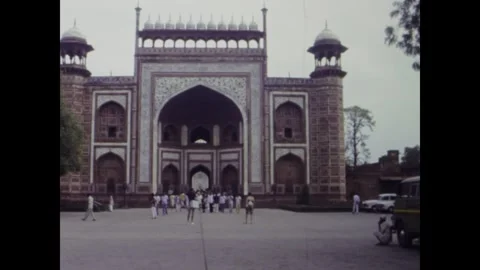 Tourists visiting the taj mahal complex in 1974 Stock Footage 291084574