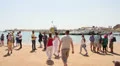 Tourists Waiting on Beach for Boat Trip HD Footage