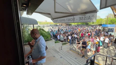 Tourists waiting in long queue for Eiffel Tower tickets Stock Footage 334106654