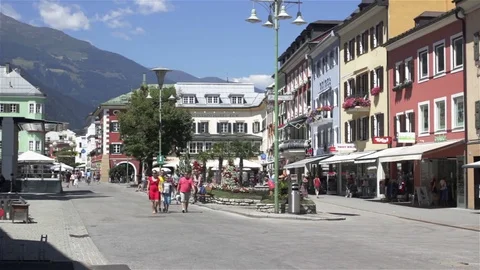 Tourists walk in austrian town Video stock 78941333