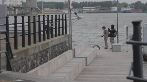 Tourists walk on the pier Stock Footage 36738314