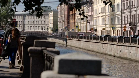 Tourists walk on the side of the Griboedov channel in the day Stock Footage 120559615