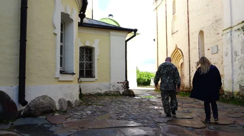 Tourists walk through the historic area of ancient buildings Cyril Belozersky Stock Footage 68062653