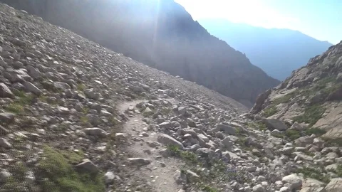 Tourists walking along the mountain trail Stock Footage 80771224