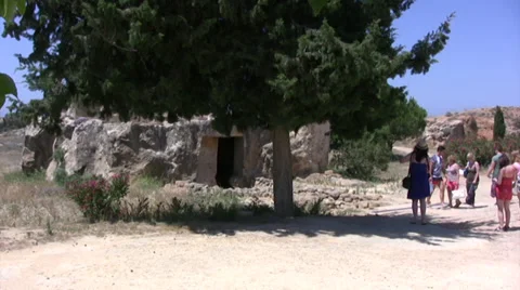 Tourists walking along path at Tombs of the Kings in Paphos Stock Footage 39691730
