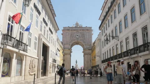 Tourists Walking Along Rua Augusta Toward Triumphal Arch in Lisbon, Portugal Stock Footage 339028794