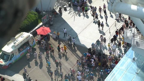 Tourists walking and queuing up to enter the London Eye. Video stock 114814552