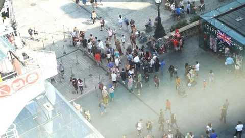 Tourists walking and queuing up to enter the London Eye. Stock Footage 114822911