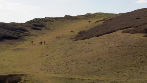 Tourists Walking on Cliff Top Stock Footage 151781528