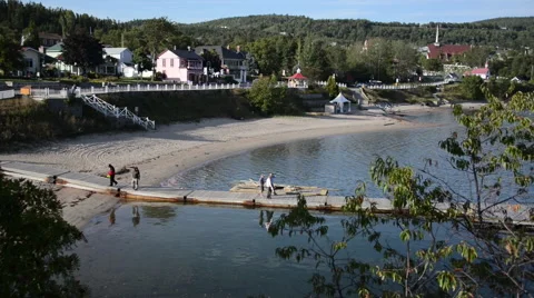 Tourists walking on a dock at the beach Stock Footage 63870113