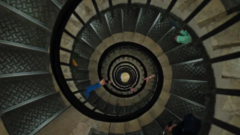 Tourists walking down the stairs from the top of the Arc de Triomphe. Stock Footage 245454071