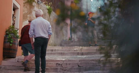 Tourists Walking Down Stone Steps On Grisia Street In Rovinj Croatia Video stock 335838382