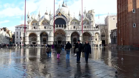 Tourists Walking On The Flooded St Mark's Square With A View On Basilica, Venice Stock Footage 151049133