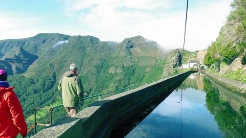 Tourists Walking on Hiking Pathway Levada Waterway Stock Footage 72004403
