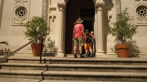Tourists Walking Into Old Cathedral Stock Footage 119229129