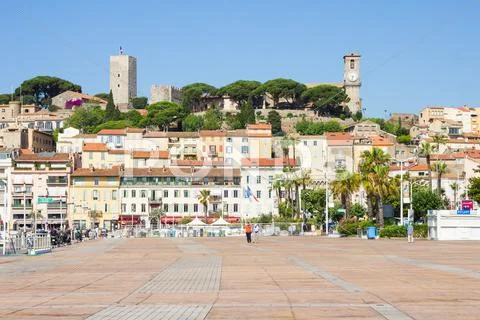 Tourists walking in the old port of Cannes, France Stock Photos