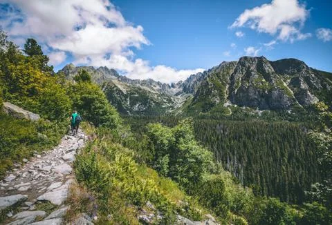 The tourists on the walking path. Tatra background. 库存照片