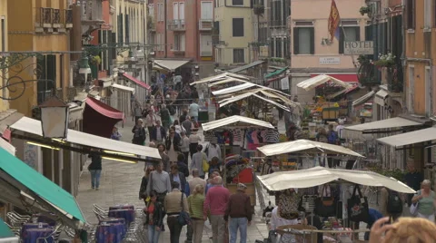 Tourists walking on Rio Tera S. Leonardo in Venice Stock Footage 59869779