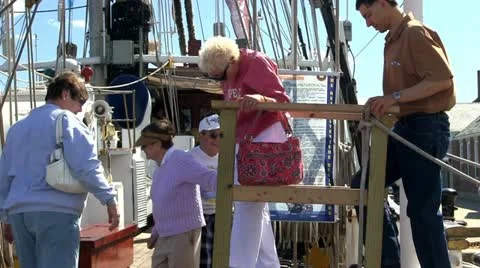 Tourists walking onto ship Stock Footage 12183839