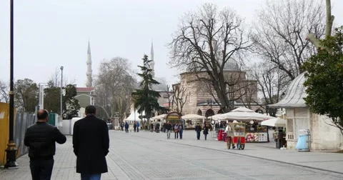 Tourists walking at square with Blue Mosque in Background Stock Footage 49096656