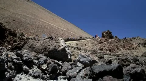 Tourists walking on the Teide Volcano Stock Footage 11337401