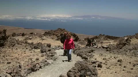 Tourists walking on the Teide Volcano Stock Footage 11337659