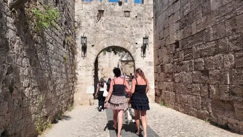 Tourists Walking Through Ancient Medieval Castle Gate Stock Footage 340575883