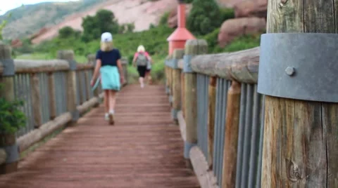 Tourists walking through bridge Stock Footage 54467361