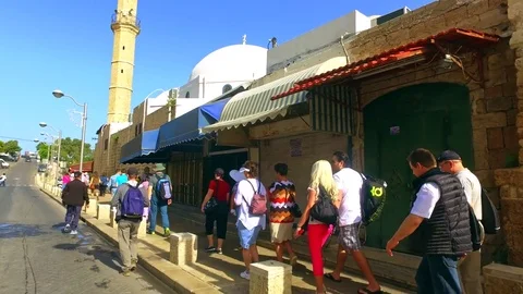 Tourists walking through streets of Israeli town of Nazareth Stock Footage 73607075