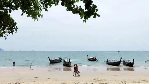 Tourists walking on the white beach, Ao Nang Stock Footage 343806574