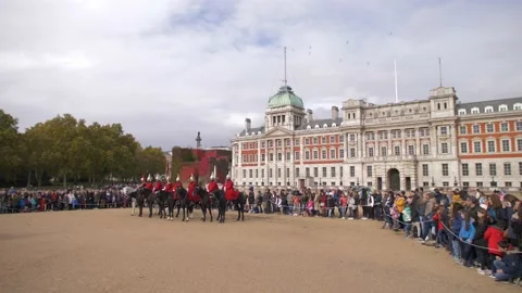 Tourists watch British Household Cavalry slow motion 4K Stock Footage
