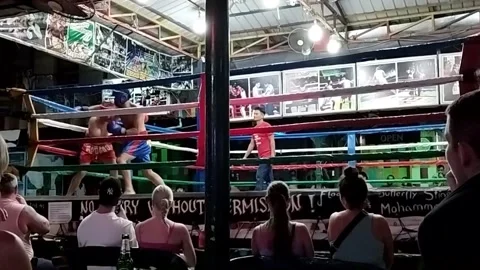 Tourists Watching Muay Thai Boxing Match (with audio) phi phi island Stock Footage 343205697