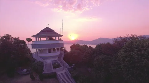 Tourists watching sunset on view point building Stock Footage 66745763